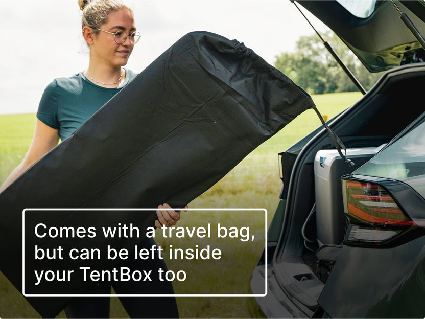 Person placing the TentBox BackRest inside its travel bag into a car boot. Text reads 'comes with a travel bag, that can be left inside your TentBox too'.