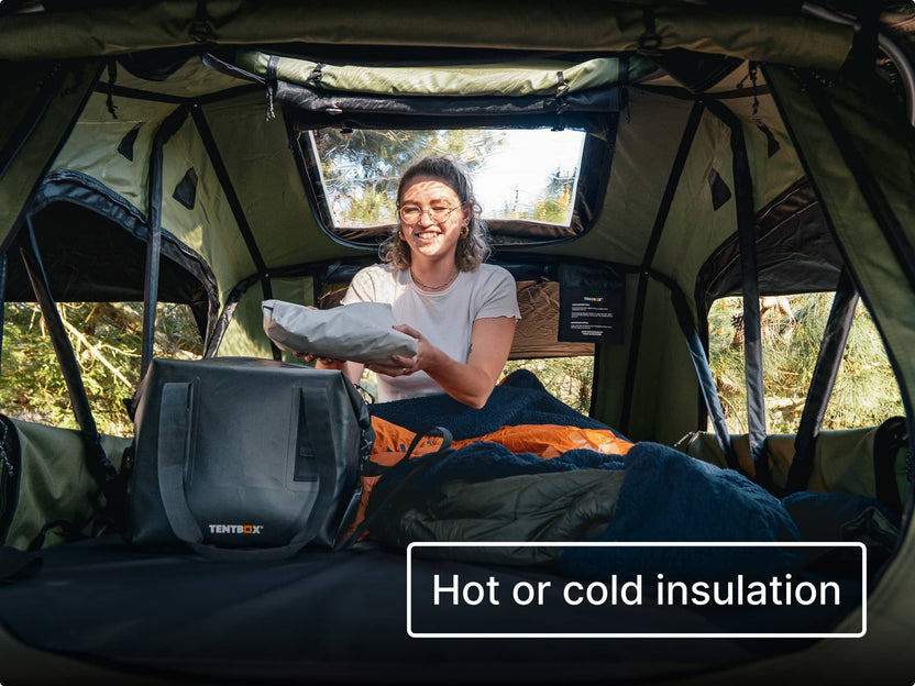 Person inside a TentBox, taking a fresh takeaway out of the insulated CoolBag. With text 'Hot or cold insulation'.