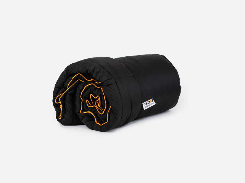 ADB - TentBox Synthetic Down Blanket rolled up ready to use