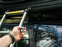 ASCA - TentBox Security Alarm person showing how to use remote control