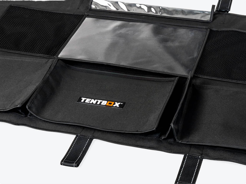 Close up of black Storage Pockets with 'TentBox' logo on a white background.