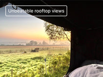 View from inside the TentBox of a grassy field with a sunset, text overaly reads 'Unbeatable rooftop views'.