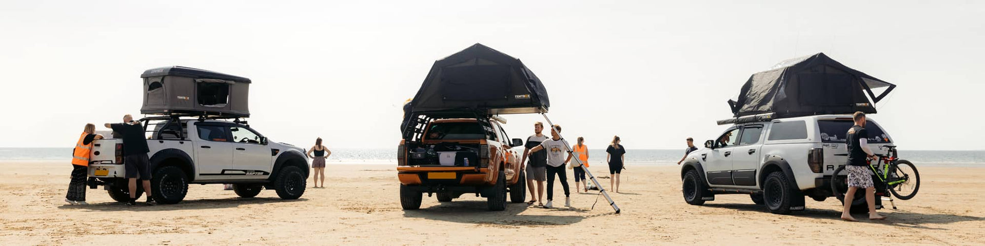 Two TentBox Lites and a Classic camping on the beach
